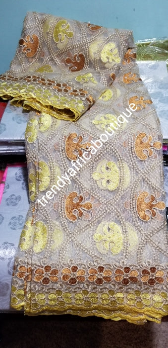 Clearance: Classic French lace fabric in beige soft yellow/gold embriodery design.