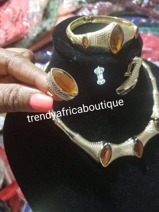 Top quality costume Dubai jewelry set in 18k gold plating available in brown stone or Red stone design. High quality hypoallergenic jewelry set. 4pcs set. One size fit ring. African party jewelry set