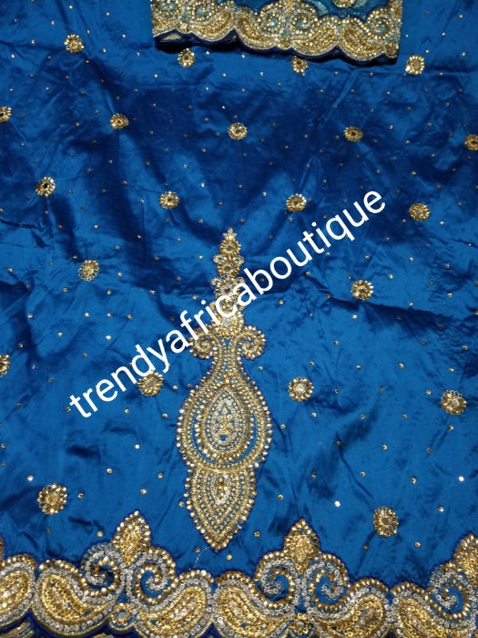 SALE,SALE- New arrival Nigerian Tranditional wedding George wrapper. Embellished with quality dazzling beads/crystal stones design in beautiful Turquoise blue. Full 5yds + 1.8yds matching blouse + free headtie. Indian-George.