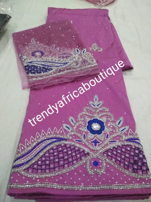 Light purple/royal blue all over crystal stones and hand cut border.. Nigerian VIP hand stoned silk George wrapper. 5yrd + 1.8yrds matching net blouse. Igbo/Nigerian Wrapper. For wrapper or skirt/blouse. Excellent lustrous quality