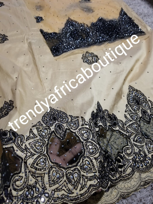 Gold/black mix all over crystal stones, organza border design. Nigerian VIP hand stoned silk George wrapper. 5yrd + 1.8yrds matching net blouse. Igbo/Nigerian Wrapper. For wrapper or skirt/blouse. Excellent lustrous quality