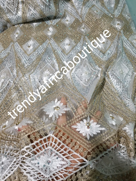 Latest design: African French lace/guipure-lace fabric embellished with beads & crystal stones all over to perfection. Sold per 5yds. Nigerian Bridal lace fabric white/gold.