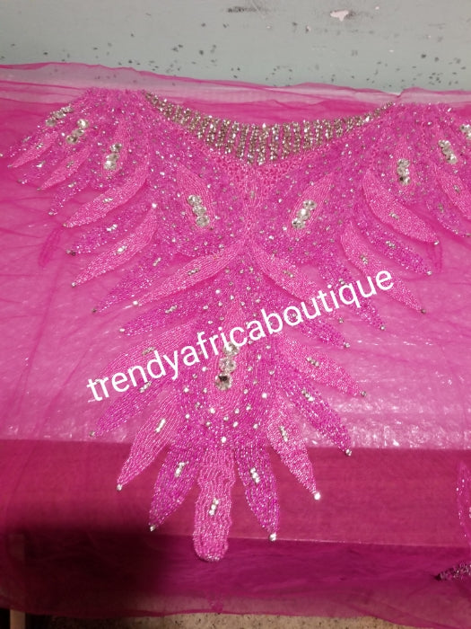 Fuschia pink Heavily-beaded net for making blouses. Popularly use by Igbo/Delta/edo women for big Occasions. Comes in 1.8yds lenght already design for your beautiful blouse
