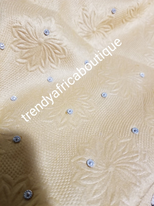 Latest skin taffeta George, champagne Gold beaded & stoned 2.5yds + stoned Net wrapper + 2.5yds + 1.8yds matching net blouse. Sold as a set and price is for the set. Indian-George