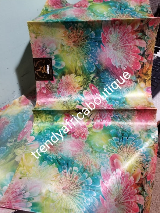 Multi color 2 in 1 pack Sago gele head tie for Nigerian head wrap. Beautiful design. Soft texture, easy to make into beautiful Nigerian party gele. Excellent quality. Sold as a park. Pink multi color