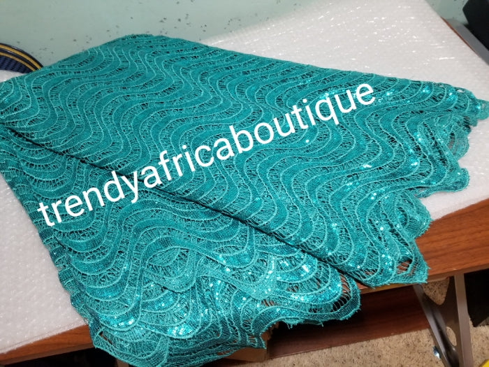 Clearance: turquoise blue Cord-lace fabric for making Nigerian party outfit. Sold per 5yds. Price is for 5 yds. Hand cut Soft Sequence guipure-lace