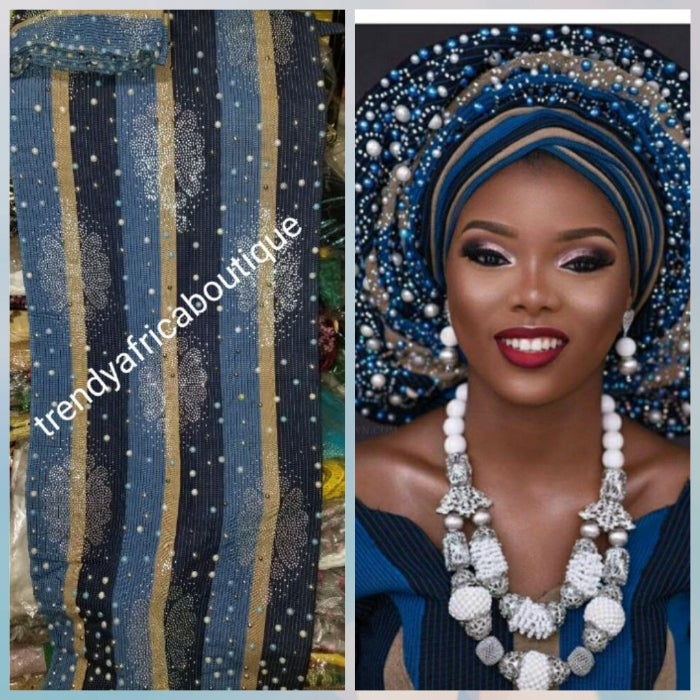 Navy/royalblue/champagne gold Beaddazzled Aso-oke set. 3pcs set for Gele/ipele (shoulder shawl) and a piece for making men cap. Sold as a set. Price is for set. Nigerian Celebrant Aso-oke from Nigeria. Quality beaded and flower stone work