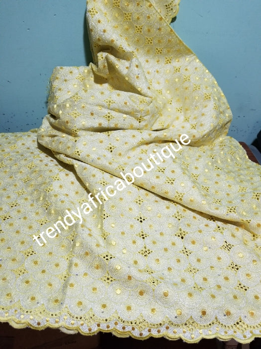 Classic embriodery yellow swiss lace fabric. Yellow lurex and crystal stones. Soft quality swiss lace with small holes all over. Classic design. Sold per 5yds, price is for 5yds. Ideal color for men or women Nigerian traditional outfit