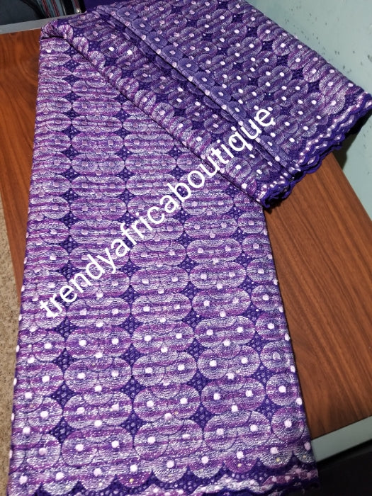 Classic embriodery purple swiss lace fabric. silver and lilac lurex and crystal stones. Soft quality swiss lace with small holes all over. Classic design. Sold per 5yds, price is for 5yds. Ideal color for men or women Nigerian traditional outfit