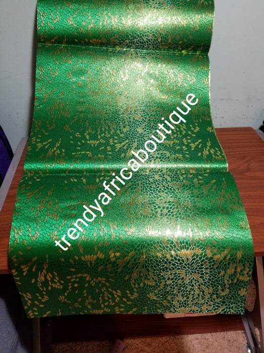 Nigerian green/gold design Sago Gele head wrap. 2-1 pack gele. Easy to tie. 2 yds long by 19 inches wide. Classic African/Nigerian fabric for making gele (headtie) Sold per set. Price is for one set