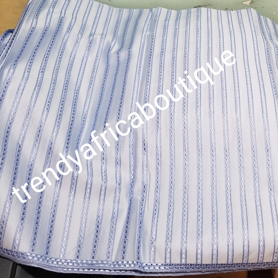 clearance Lustrous quality sky blue Atiku swiss voile lace fabric for Nigerian Men native outfit. Soft texture fabric with beautiful embriodery, Can be use for agbada/3pc outfit for men. Sold per 5yds. Price is for 5yds. Men traditionally wedding outfit