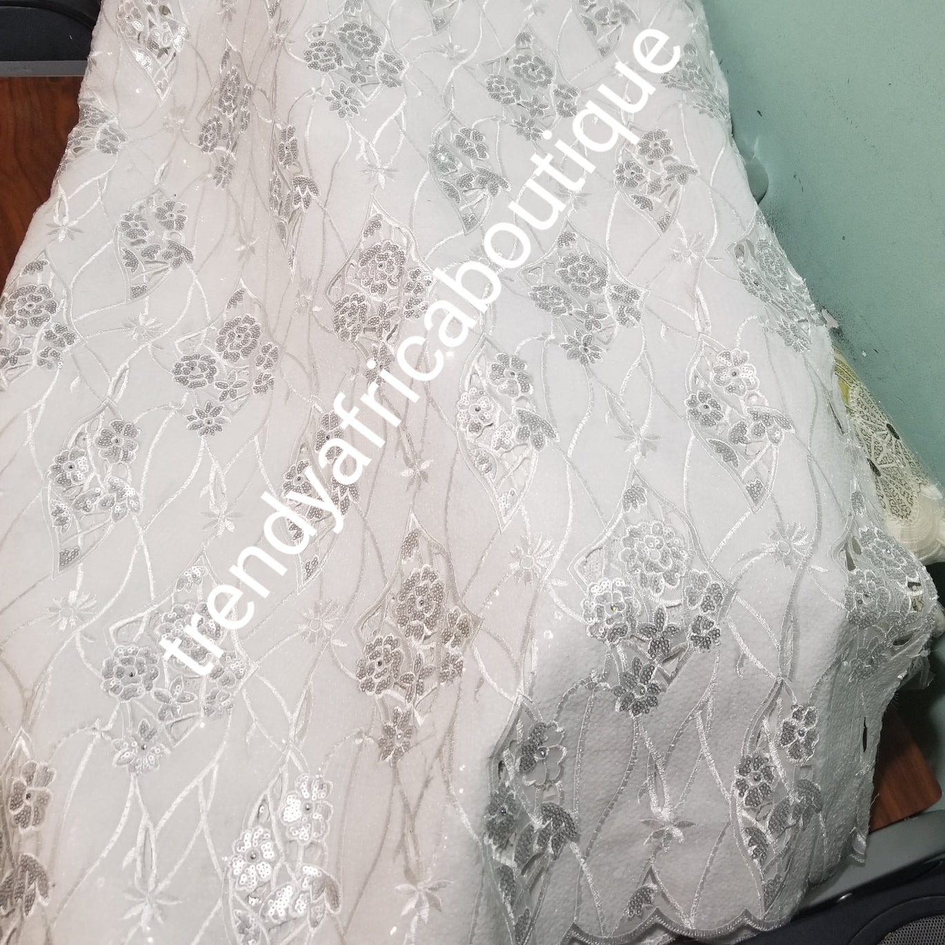 Sale: Pure white sequence Double Organza swiss lace Fabric. Beautiful handcut lace embellished with sequence. Classic Big Nigerian party lace sold per 5yds. Exclusive celebrant organza ideal for Iro/buba