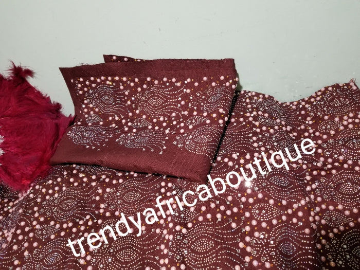 Bonus offer Wine Beaddazzled Aso-oke. 4pc wide Gele with 72" long Ipele (shoulder shawl). Can order the whole set or separately. Nigerian Celebrant Aso-oke with matching fila + feather fan from Nigeria. All over Swarovski stone work on gele/ipele