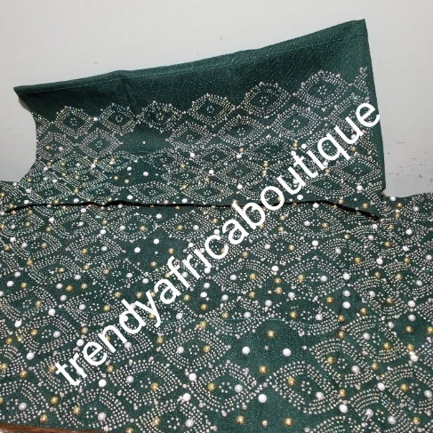Bonus offer emerald green bedazzled Aso-oke. 4pc wide Gele with 72" long Ipele (shoulder shawl). Sold with or without feather fan. Aso-oke with matching fila and feather fan. All over Swarovski stone work on gele/ipele. Quality Celebrant aso-oke