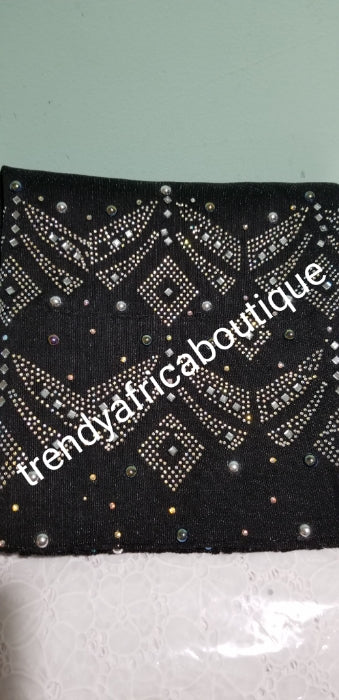 Black aso-oke gele beaddazzled with crystals stones and white pearls. Sold as Gele only. Nigerian Traditional Aso-oke head wrap. Buy gele only or Gele+ black fila for making hubby cap