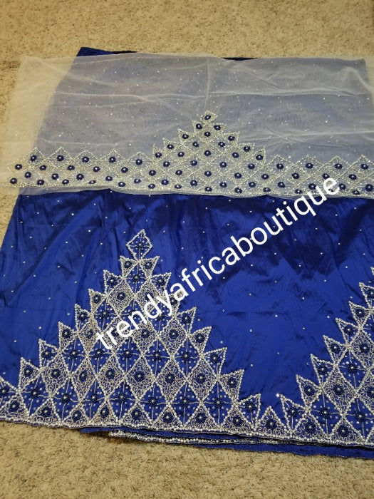 Clearance: Quality taffeta silk George wrapper. Royal blue + white contrast blouse embellished with all over silver crystal stones and beads. Nigerian traditional wedding George wrapper for, Delta/Igbo/Edo weddings. This is 5yds + 1.8yds blouse