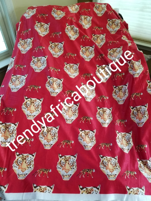 Red/white Quality Isi-agu Igbo traditional/ceremonial fabric for men or womem. Tiger head fabric. Sold per one yard. Price is for a yard. Can be use for wrapper, blouse or shirt for men.