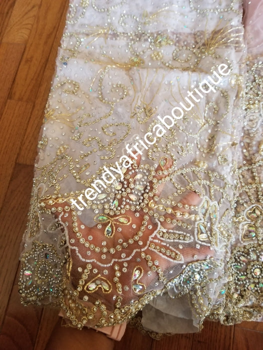 Super quality sweet peach VIP Madam Net George wrapper for Nigerian bridal/Celebrant outfit. all over hand beaded/ stoned 2.5yds+ 2.5yds + 1.8yds matching net for blouse. Happy client Rocking same design in Gold.