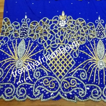 Ready to ship: Royalblue 1st lady Nigerian big Celebrants VIP hand Stoned with dazzling Crystal stones George wrapper. 2.5yds + 2.5yds + 1.8 yds matching net blouse. Exclusive handcut design for Igbo/delta women or men outfit