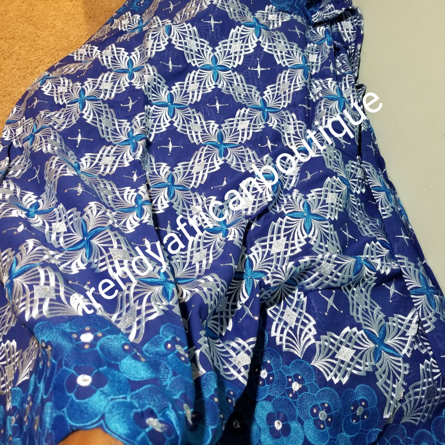 Clearance Give away price: royal blue Swiss Embriodery Lace fabric with clear crystal stones. Great quality and texture. Sold per 5yds. Price is for 5yds. African lace for making party outfit. Unisex color