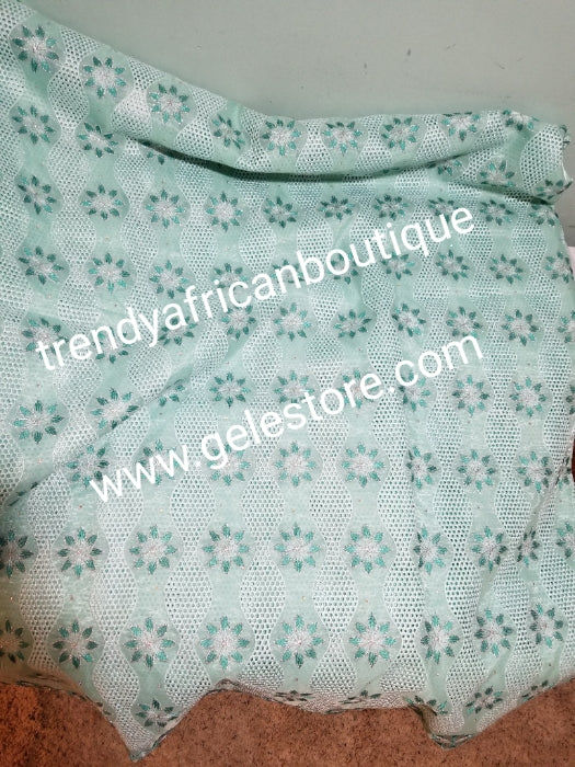 Clearance Give away price: Mint green Double organza Swiss Embriodery Lace fabric with clear crystal stones. Great quality and texture. Sold per 5yds. Price is for 5yds. African lace for making party outfit. Unisex color