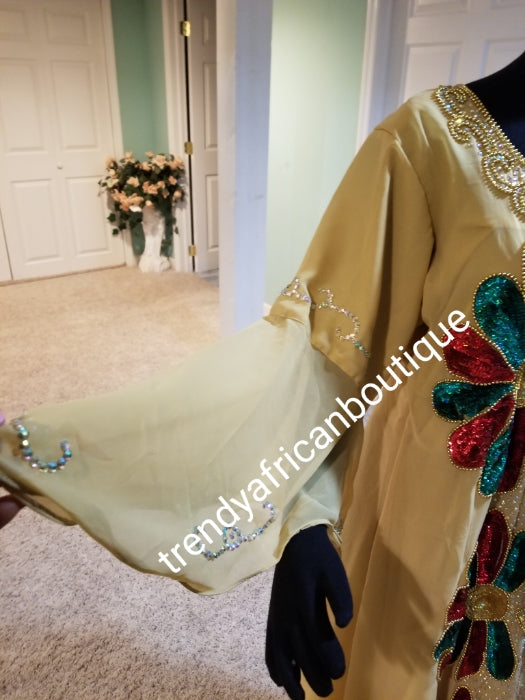 Ready to ship: Beige dubai kaftan dress. free flowing embellished with Multi color sequence front and back dress to perfection. Availablein size, M,L,XL. Chiffon includes headtie. 60' long
