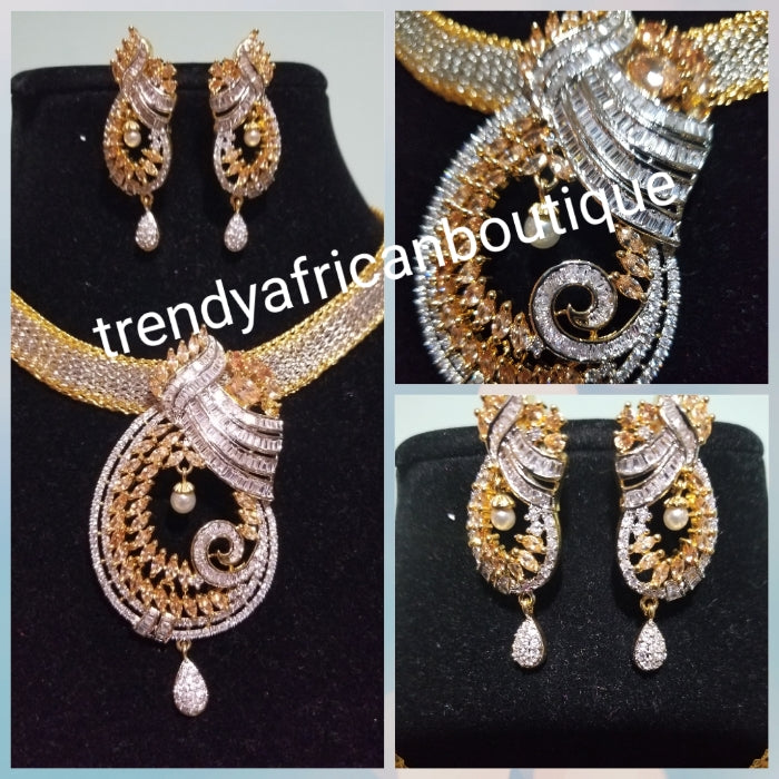3pcs 22k quality 2 tone Gold electroplating in choker set. Sold as a set. Pendant is mounted with CZ diamond stones. Top quality/hypo allergenic plating