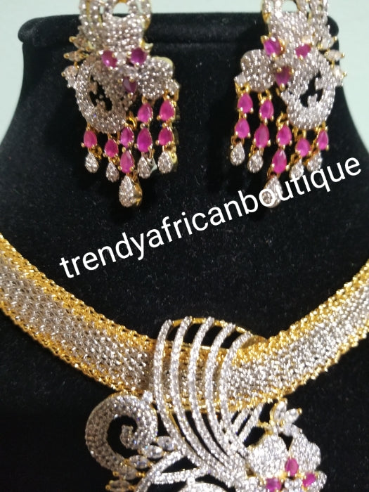 2pcs 22k quality 2 tone Gold electroplating in choker set. Sold as a set. Pendant is mounted with pink and crystal CZ diamond stones. Top quality/hypo allergenic plating
