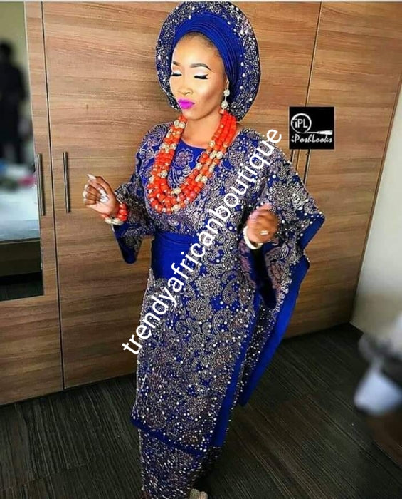 Latest bead-dazzled Aso-oke set for Nigerian Traditional Weddings/ceremonies. All hand made stoned and beaded classy blouse/wrapper + Gele/ipele. Produce-per-order only. Custom-made design in your color of choice. Allow 6-8 weeks for order process.