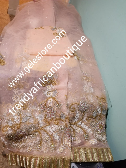 Ready to ship. Sweet Peach net George. perfect stone work for traditional Bridal outfit. Quality beaded and dazzling crystal stoned on a net George wrapper. 2.5yds + 2.5yds + 2yds.fabric. Sold as a set, price is for a set.