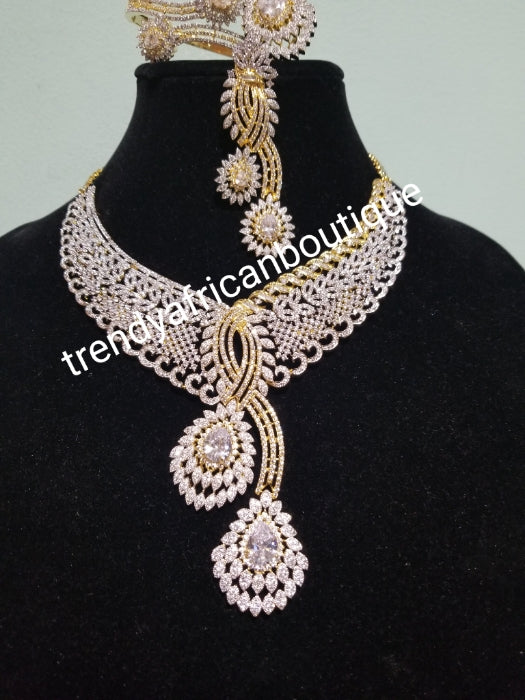 Back in stock- Special price: New arrival Celebrants 4pcs matching set of 22k Gold Electroplated with CZ silver stones setting. Quality piece of accessories, hypoallergenic. Necklace, earrings, ring and bangle set.