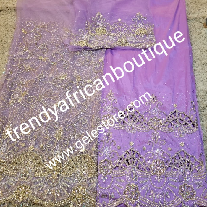 Ready to Ship: Gorgeous Igbo Traditional Bridal outfit- quality Lilac net + Taffeta George wrapper embellished with dazzling Crystals all over. 2 wrapper + 1.8yds net for blouse. Ideal for making Celebrant outfit. Model show wearing Gold Net