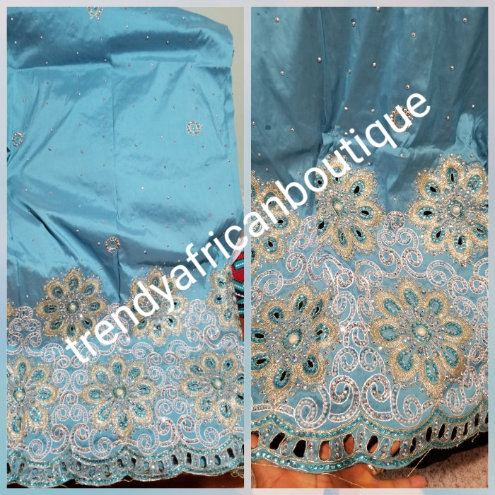 Sale: New arrival Nigerian Tranditional wedding George wrapper. Embellished with quality dazzling beads/crystal stones. Classic sky blue. Full 5yds + 1.8yds matching blouse + free headtie. Indian-George made with original taffeta silk