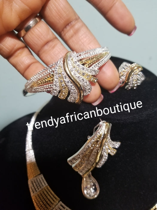 Sale sale: Beautiful Dubai costume jewelry set in 18k two tone gold plating. High quality hypoallergenic jewelry set. 4pcs set. Sold per set. Embellished with crystal stones.