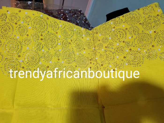 New arrival beautiful sweet yellow Bedazzled Aso-oke Gele headtie. 4 wide for making bigger gele. classic Latest design of Nigerian Traditional aso-oke. Original aso-oke + Stone work. Hand weave in Nigeria for best quality 72" long by 26" wide