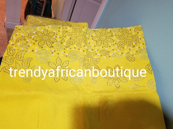 New arrival beautiful sweet yellow Bedazzled Aso-oke Gele headtie. 4 wide for making bigger gele. classic Latest design of Nigerian Traditional aso-oke. Original aso-oke + Stone work. Hand weave in Nigeria for best quality 72" long by 26" wide