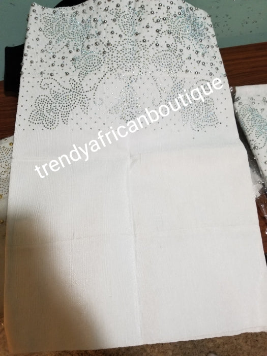 New arrival white Bedazzled Aso-oke use for Gele (headtie) 4 wide for making bigger gele. Latest design of Nigerian Traditional aso-oke. Original aso-oke + all silver beads and Stoned work. Hand weave in Nigeria for best quality 72" long by 26" wide