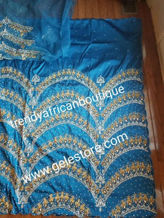 Ready to ship:  Exclusive design Turqouis blue VIP hand beaded and stoned Nigerian traditional Celebrant in quality taffeta Silk George wrapper with matching blouse. Niger/Delta/Igbo women Georges. Sold as set of 2 wrapper +1.8yds blouse.