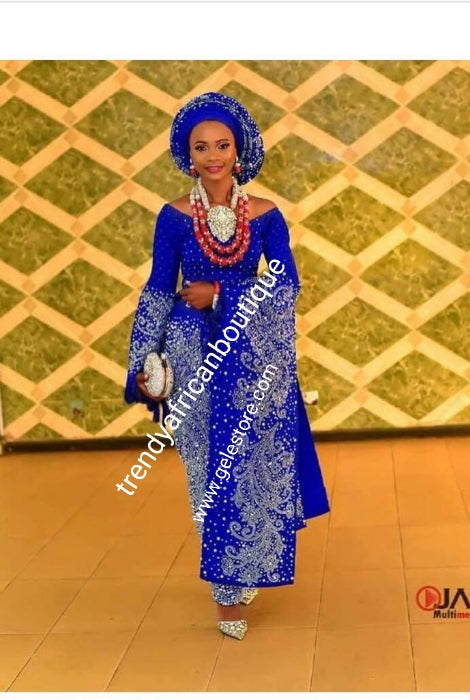 Custom-made Quality Swarovski stones, beaddazzled 4pc Aso-oke set + feather hand fan bonus. Made-to-order Nigerian Traditional wedding Bridal outfit for women. Allow 6-8 weeks for delivery. Can be made in any color of your choice