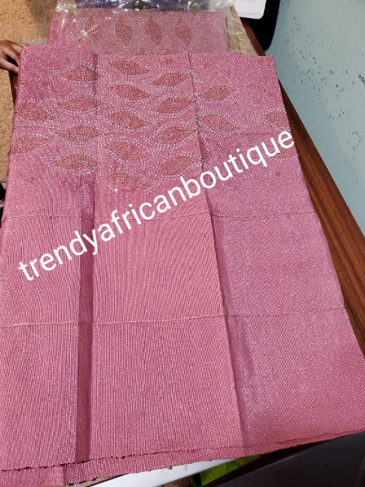 Sweet onion pink Bedazzled aso-oke. Nigerian woven traditional Aso-oke for making beautiful head wrap. Beaded and Swarovski stones work for perfect headwrap finish. Gele only. Extra wide gele for bigger head wrap. 72" long × 26" wide