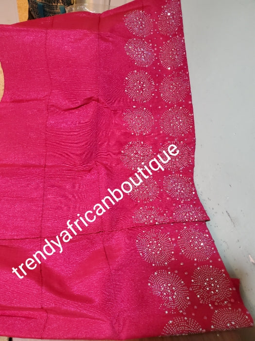 Cool fuschia pink Bedazzled aso-oke. Nigerian woven traditional Aso-oke for making beautiful head wrap. Beaded and Swarovski stones work for perfect headwrap finish. Gele only. Extra wide gele for bigger head wrap. 72" long × 26" wide