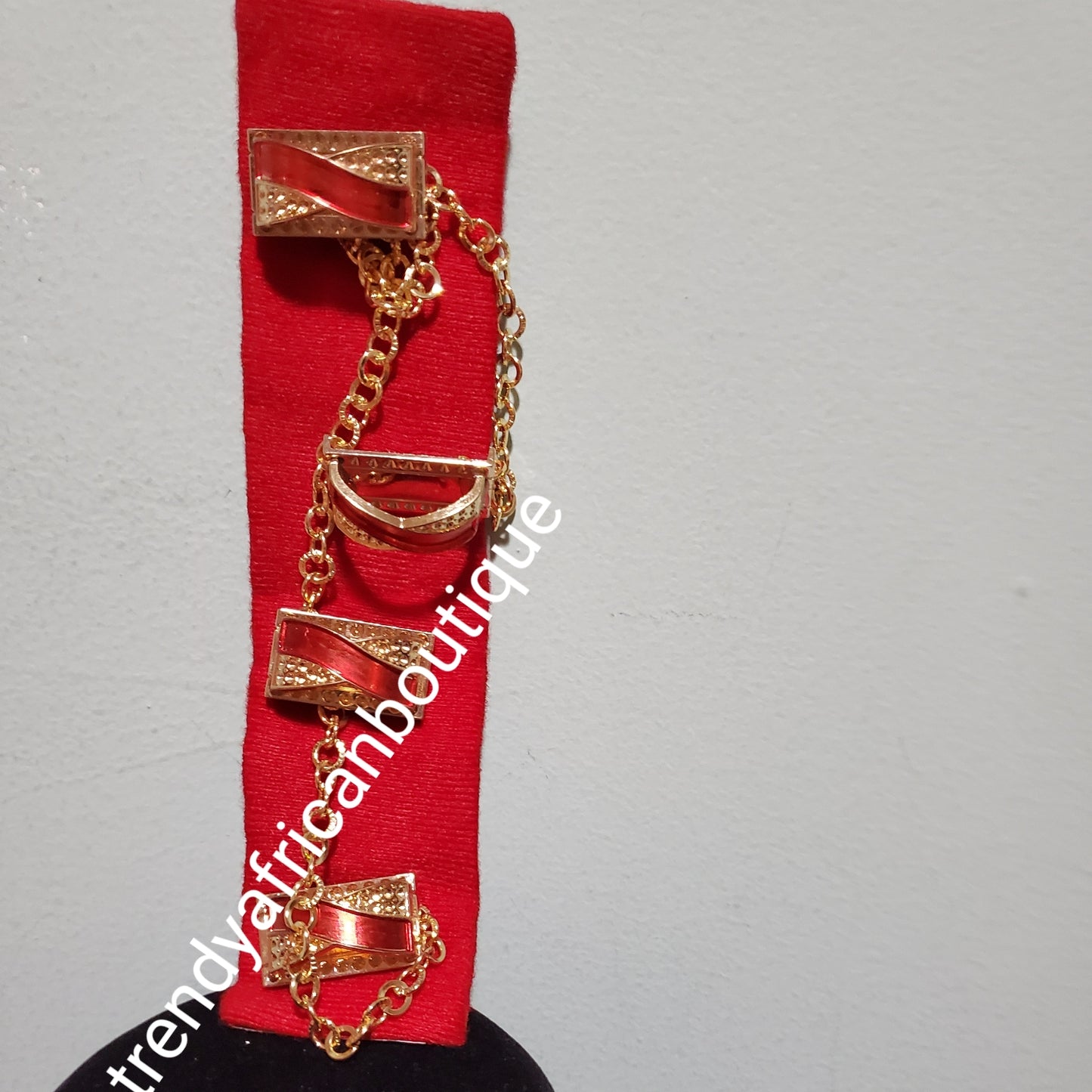 Nigerian men red pin botton for men, groom-accessories for isi-agu/shirt outfit. Quality red stone with gold plated chain. Can be use with Atiku men top or any African traditional wear.