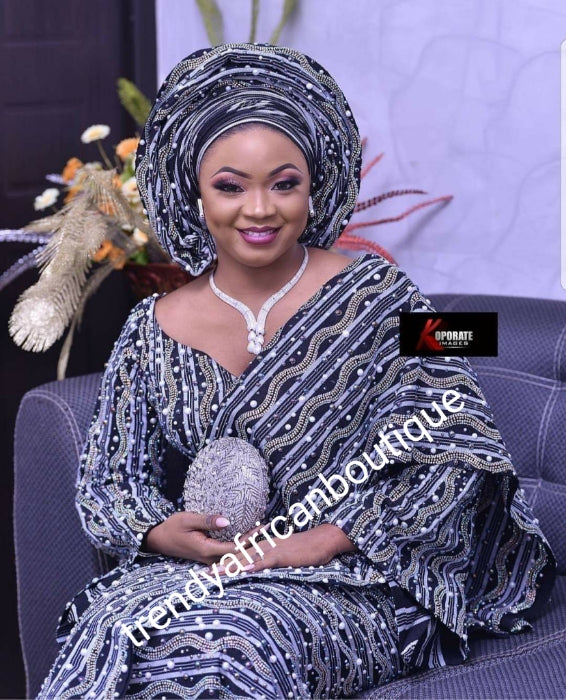 Choose your color: 4pcs wrapper/fitted blouse with bell sleeves/headtie/ipele ( shoulder piece) beaded and stoned work. Nigerian traditional Celebrant Aso-oke set from mother Land. Made-to-order only. Allow 6-8 weeks for processing time.