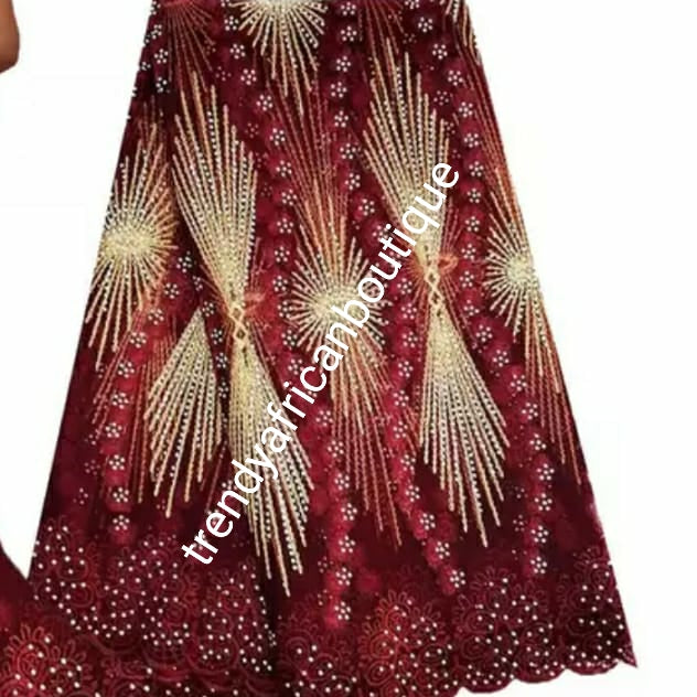 New arrival Wine/Champagne gold African French lace fabric embellished with dazzling crystal stoned Net french lace. Sold per 5yds length. Aso-ebi order available per request in your color is choice.