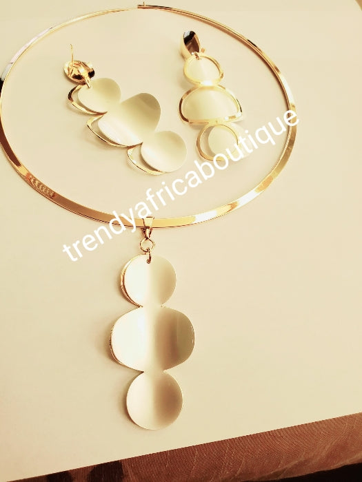 High quality 18k Gold plated 3pc pendant and drop earrings set. beautiful hypoallergenic pendant with matching earring, Sold with the Omega chain. Classic for casual wear.