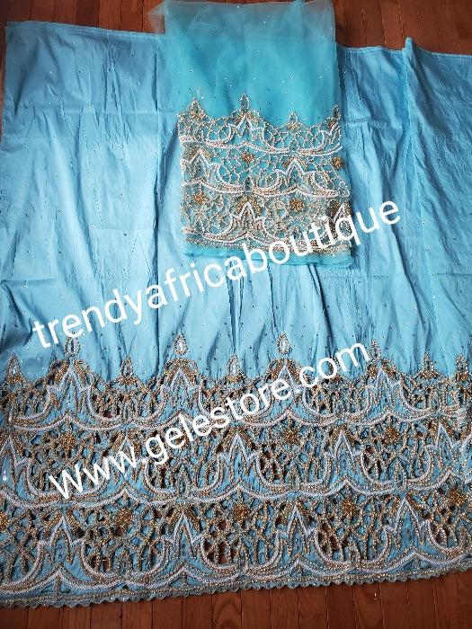 Special offer: Beautiful turquoise blue Nigerian traditional Igbo/delta women/men wrapper for big ceremoney. Original quality silk George wrapper for Traditional wedding oufit. Sold as wrapper and 1.8yds matching blouse