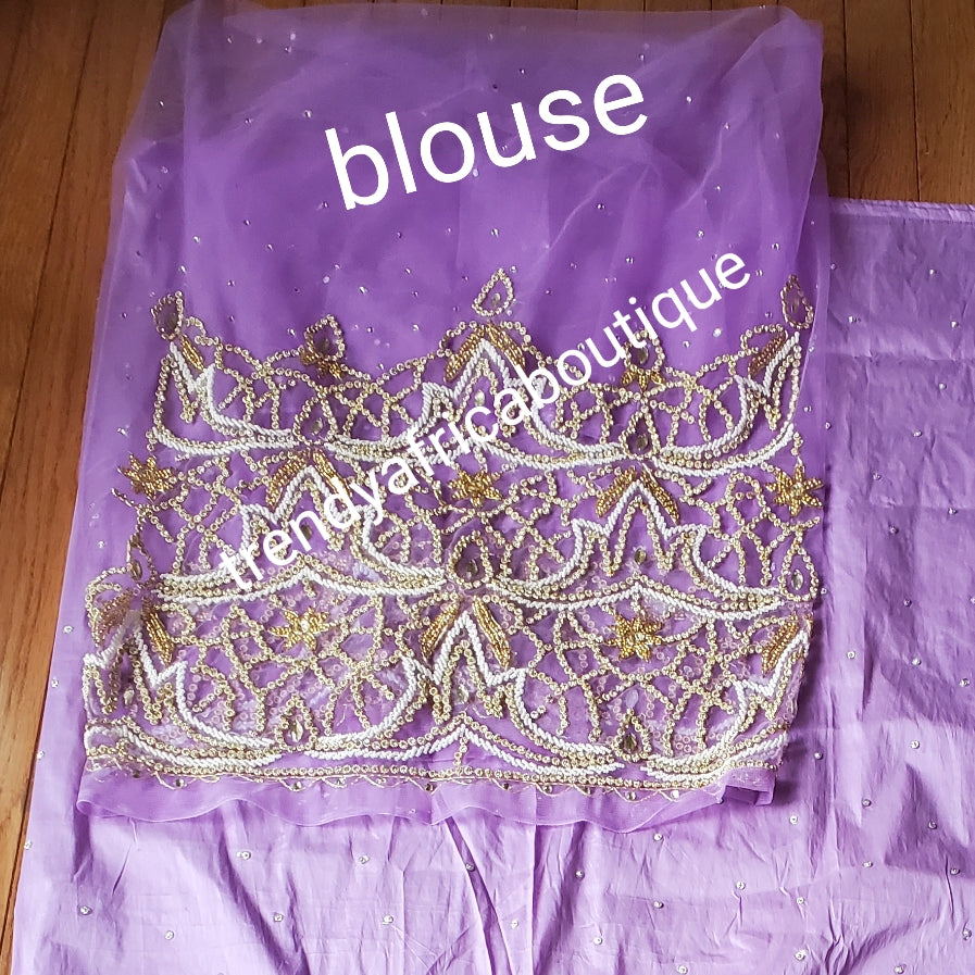 Special offer: Beautiful Lilac Nigerian traditional Igbo/delta women wrapper for big ceremoney. Original quality silk George wrapper for Traditional wedding oufit. Sold as 2 wrapper of 2.5yds + 2.5yds + 1.8yds matching net for blouse