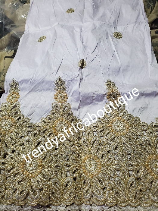 SALE: Original quality White/gold embriodery and beaded silk George wrapper. Nigerian traditional wedding George, Quality Indian-George. 5yds wrapper + 1.8yds net matching blouse. Aso-ebi available. Contact us for detail.