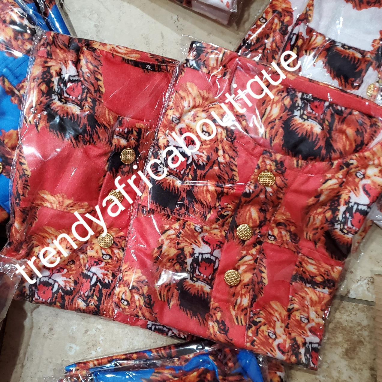 New arrival Isi-agu Igbo traditional/ceremonial shirt for men. Red/gold isi-agu shirt size 3XL Chest 50 inches, lenght 35""