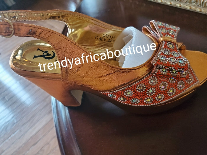 Europe size 39 Bronze/orange shoe and hand clutch set. Dazzling crystal stones. Platform heal with matching stylish hand clutch. Comfortable shoe and great balance. Light weight